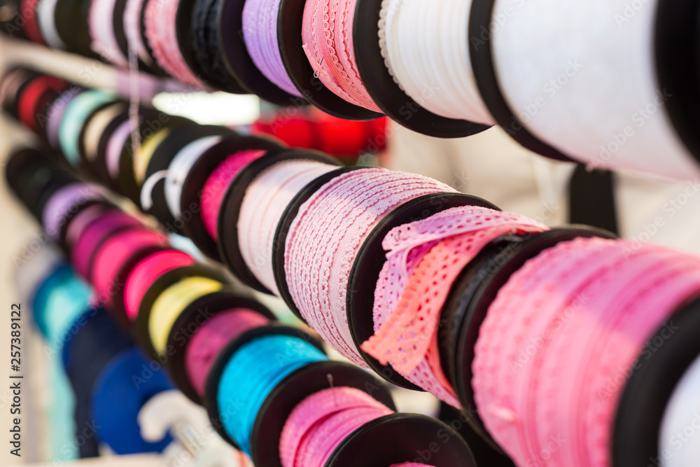 Many coils with colored textile ribbons. Many coils with colored textile ribbons.