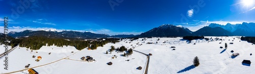Aerial view, Mittenwald snowy meadow, Alps and Karwendel mountains, Bavaria, Germany © David Brown