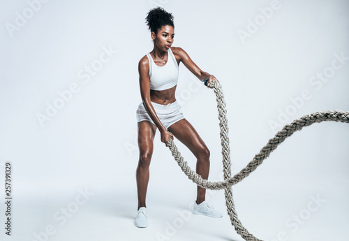 Athlete working out with ba...