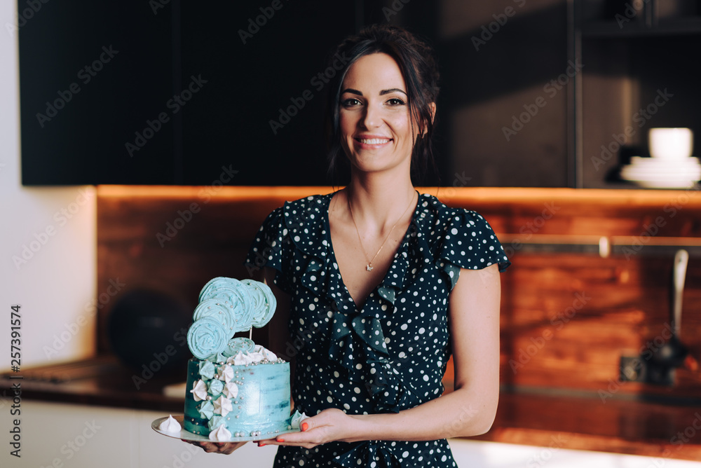 woman posing in loft with cake woman posing in loft with cake