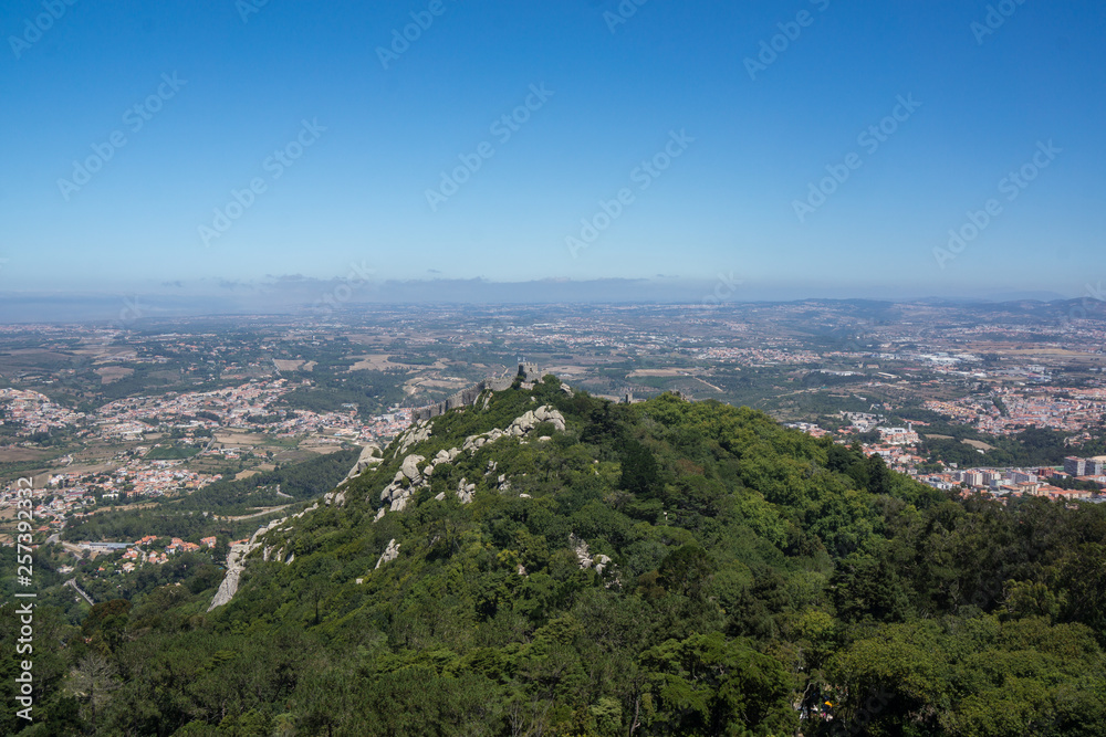 blue sky and green hill with castle in sintra