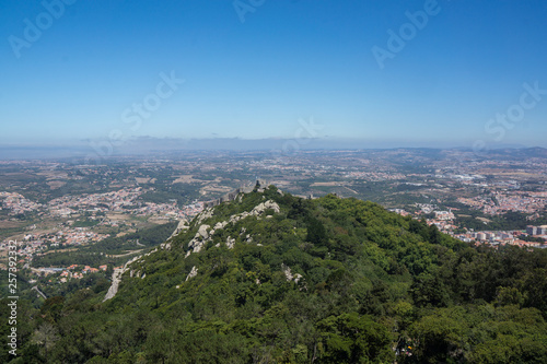 blue sky and green hill with castle in sintra