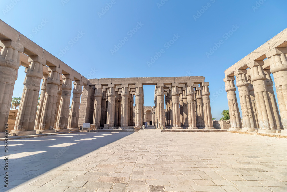 Obraz premium Luxor Temple, a large Ancient Egyptian temple complex located on the east bank of the Nile River in the city today known as Luxor (ancient Thebes).