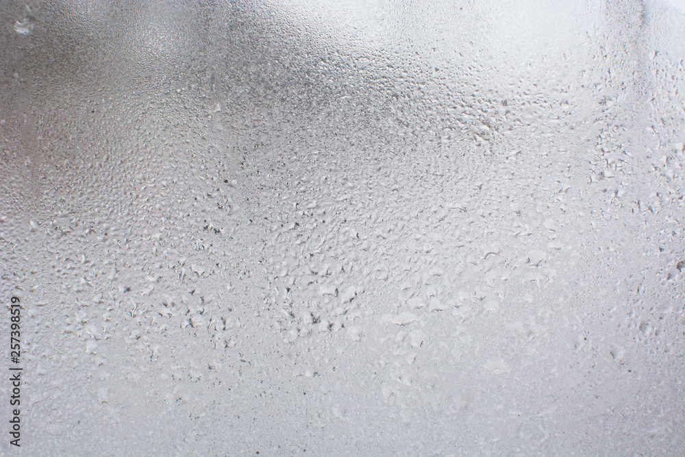 Frozen drops on the glass Frozen drops on the glass