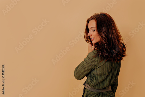 Beauty woman portrait from back. Beautiful elegant model girl with perfect fresh clean skin and shiny hair.