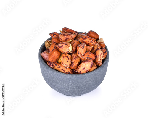 Nuts in bowl isolated on white background