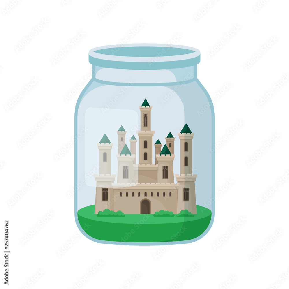 Castle in glass jar on white background.