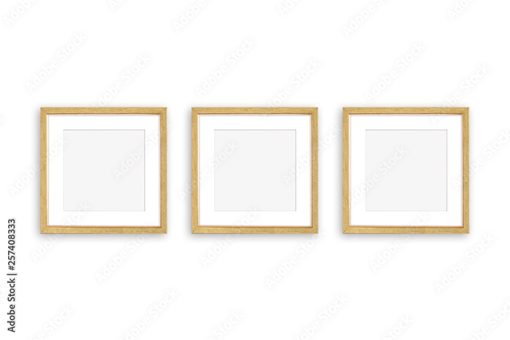 Three blank photo frames isolated on white wall,  realistic golden framework mockup