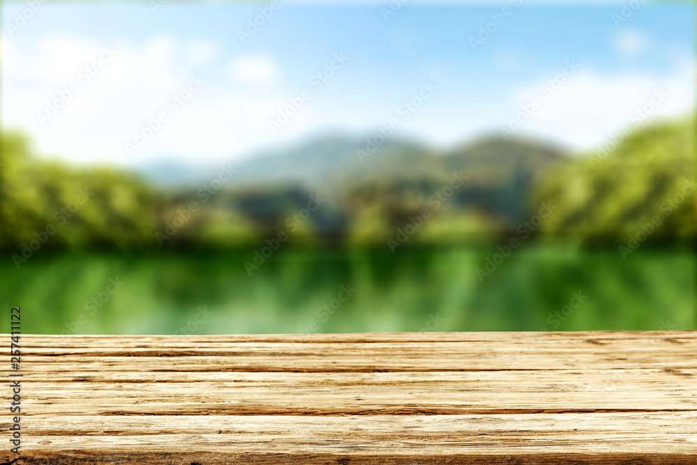 Desk of free space for your decoration and spring blurred background Desk of free space for your decoration and spring blurred background