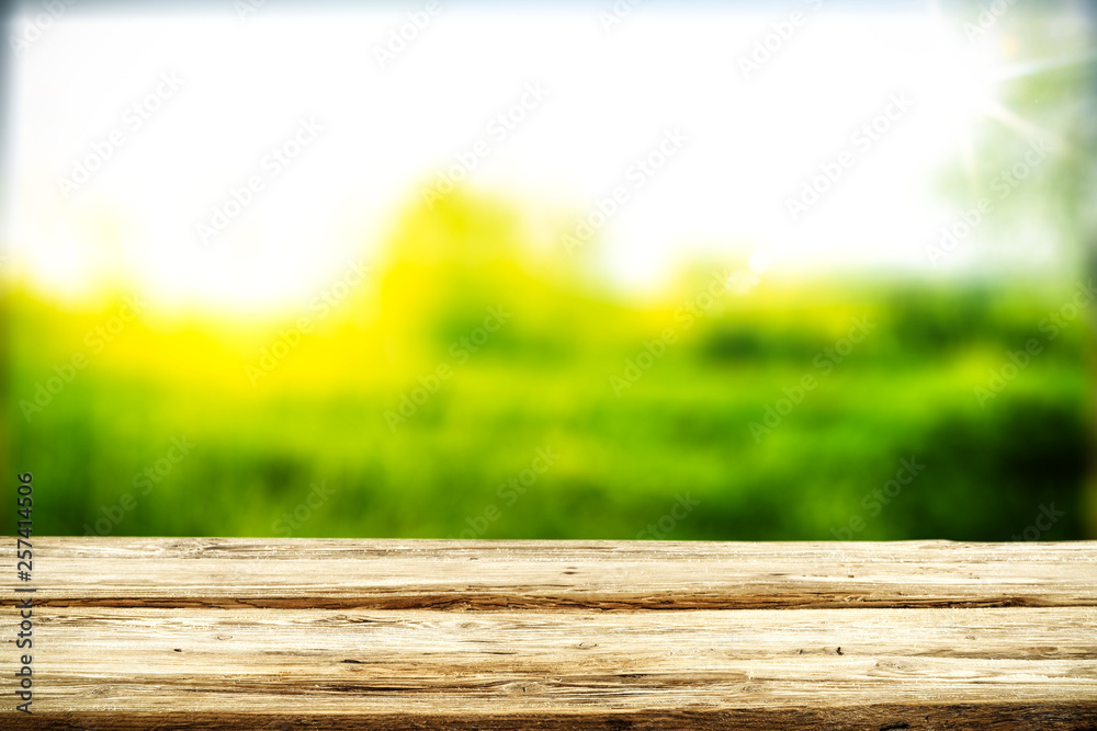 Desk of free space for your decoration and spring blurred background Desk of free space for your decoration and spring blurred background
