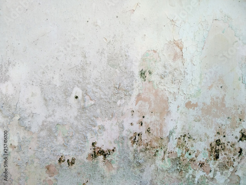Dirty and Old cement wall texture background. Weathered rusty metal abstract texture. Grunge background with peeling paint. Wall texture can be used as a wall frame and wall background.