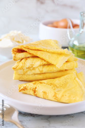 Pancakes (blinis) without flour and ingredients: cream cheese, olive oil and eggs