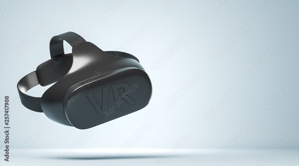 Black VR headset with logo text on the light blue background with copy space on the right side. Black VR headset with logo text on the light blue background with copy space on the right side.