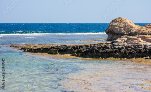 Fototapeta Naklejka Na Ścianę i Meble -  Rocks in the sea at the entrance to Coraya Bay in Egypt.