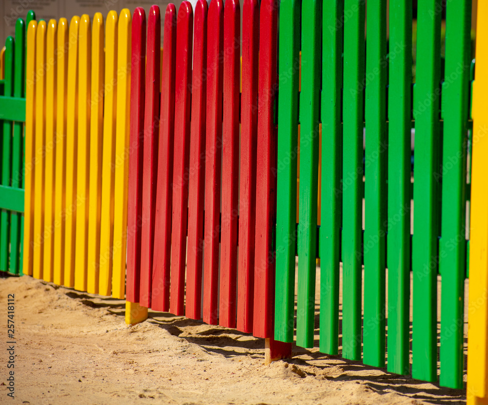 Fototapeta premium Brightly colored fence panels