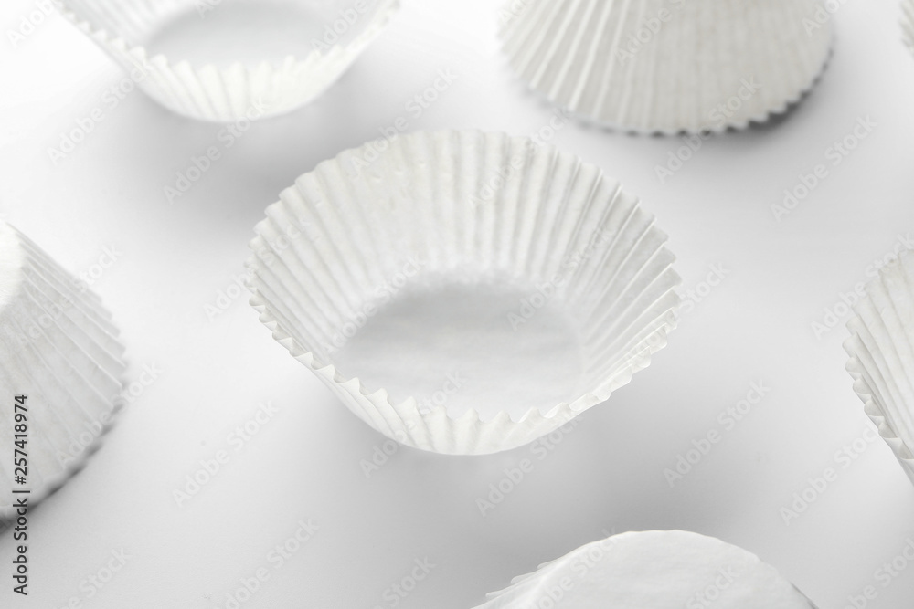 Paper cups for baking on white background