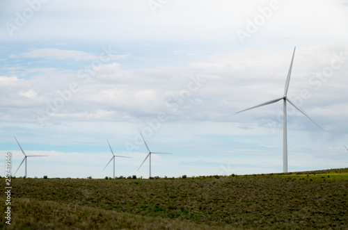 Wind tubine on a cloudy day photo