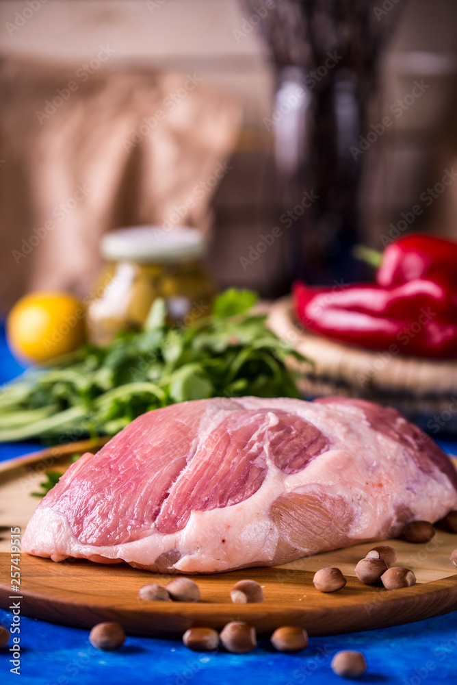 Raw pork on a wooden board