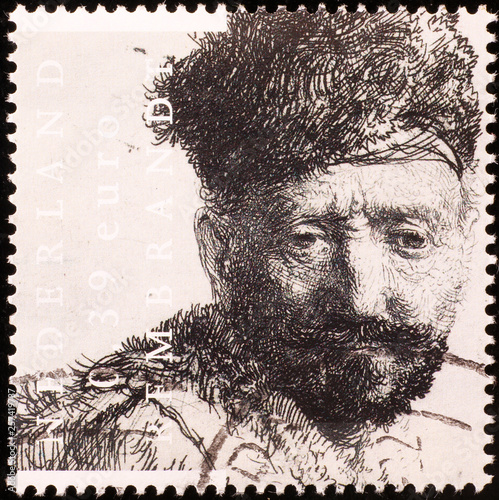 Man portrait by Rembrandt on dutch stamp
