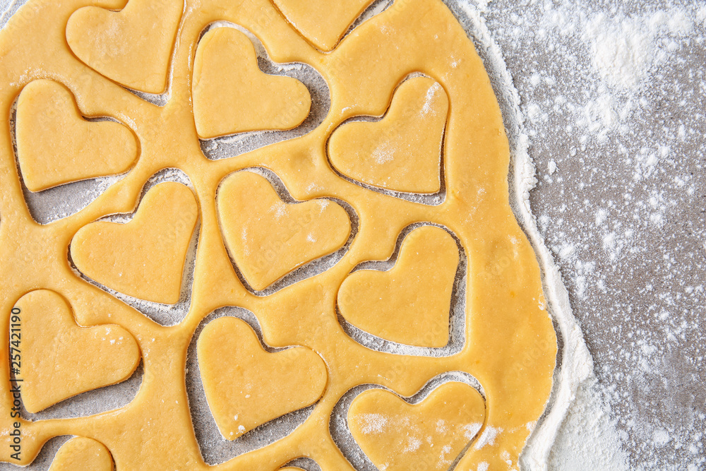 Preparing of tasty cookies on grey background Preparing of tasty cookies on grey background