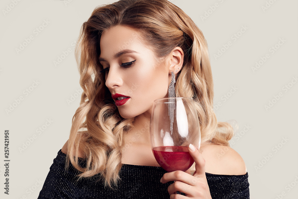 Gorgeous elegant sensual blonde woman wearing fashion black dress