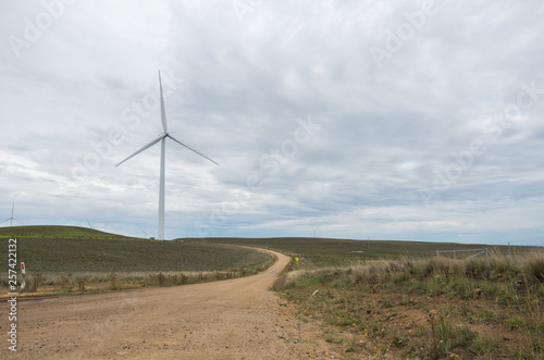 Road leading to a Wind turbine