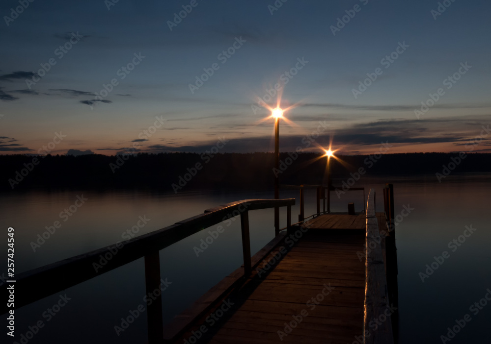 wooden jetty at sunset
