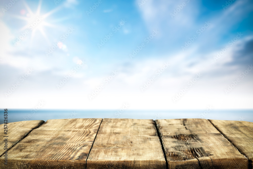 Desk of free space and summer sea landscape 