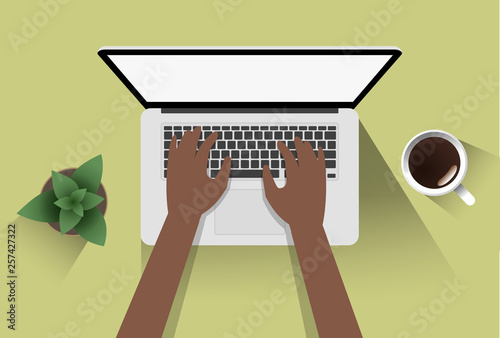 Photography man using laptop, overhand view