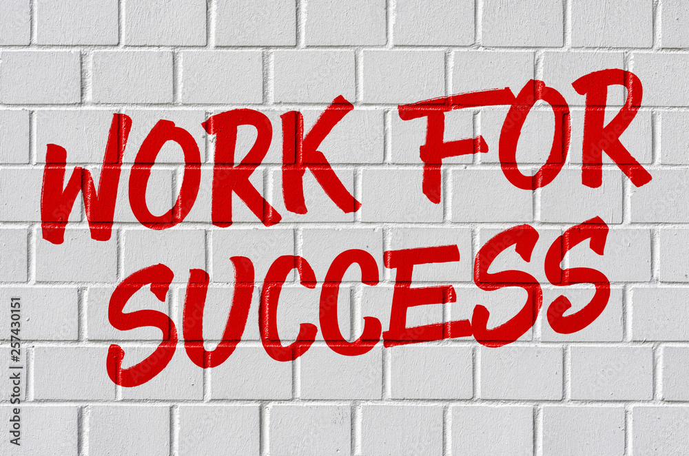 Graffiti on a brick wall - Work for success Graffiti on a brick wall - Work for success