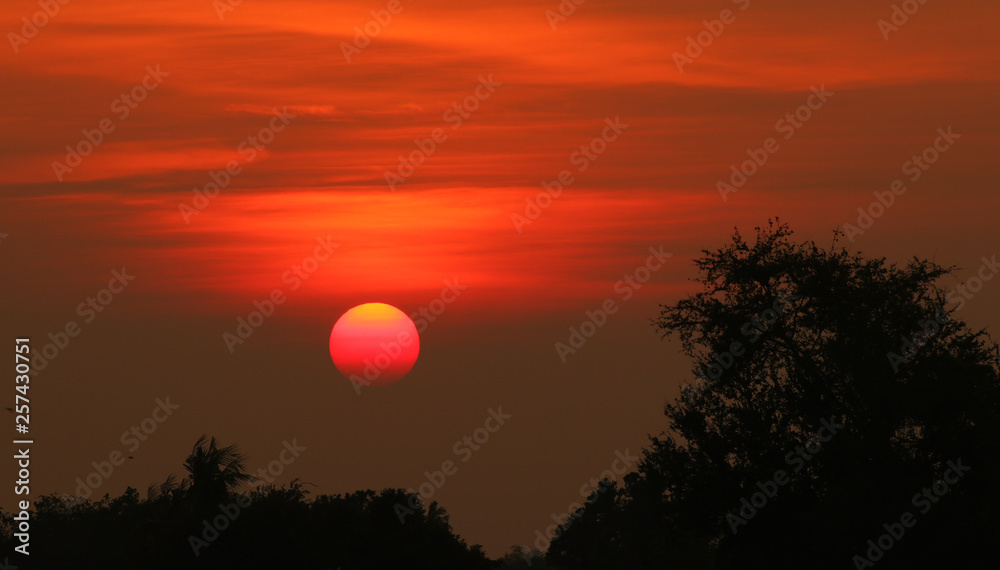 The sun is below the horizon in the evening. The sun is below the horizon in the evening.