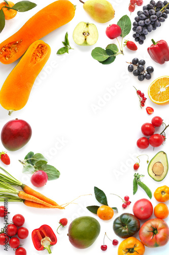 Various vegetables and fruits isolated on white background, top view, flat layout. Frame of vegetables with space for text.