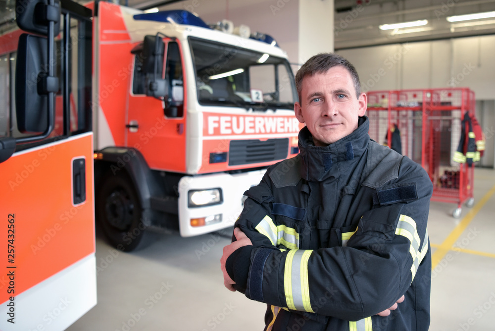 portrait of a firefighter in the operations centre at the fire-fighting vehicle portrait of a firefighter in the operations centre at the fire-fighting vehicle