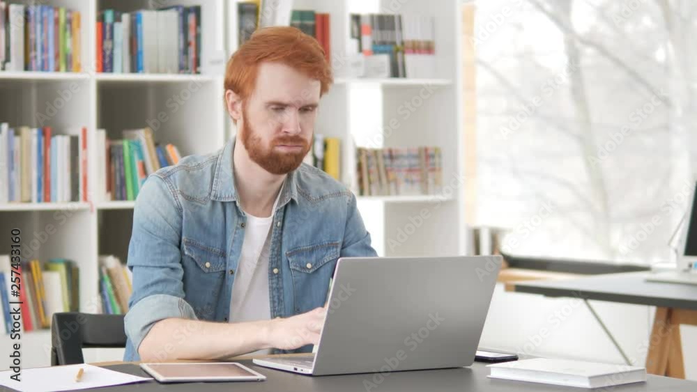 Tired Casual Redhead Man Sleeping at Work Tired Casual Redhead Man Sleeping at Work