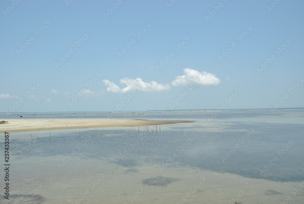 Clouds reflected in the water in Jaffna in Sri lanka