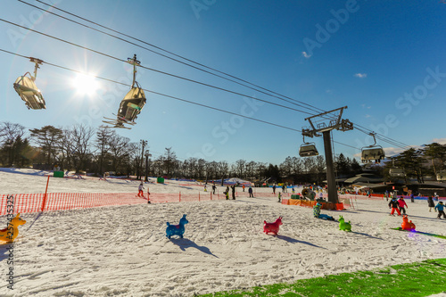 People to play ski ,snowboard and cable car at ski resort in winter on holiday of Nagano Prefecture, Japan..