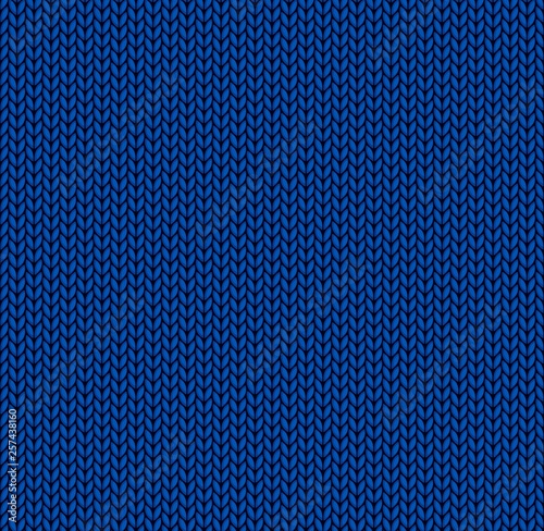 The Seamless blue knitted background.