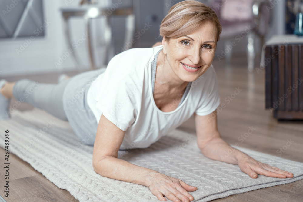 Yoga Classes At Home Beautiful Women Over 50 Years. Stock Photo 