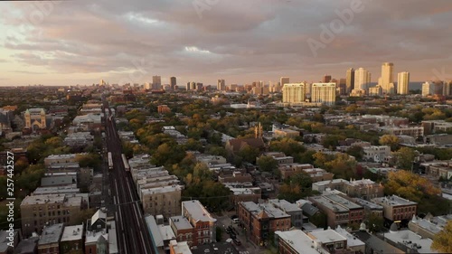 Subway Passing through Urban Neighborhood- 4k Aerial Cinematic