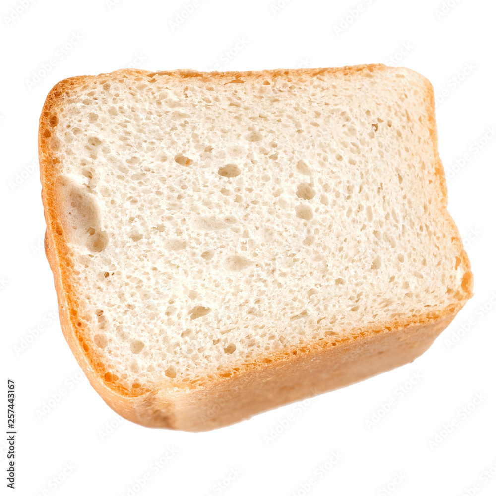 Close up image of cut of loaf bread on white against white background Close up image of cut of loaf bread on white against white background