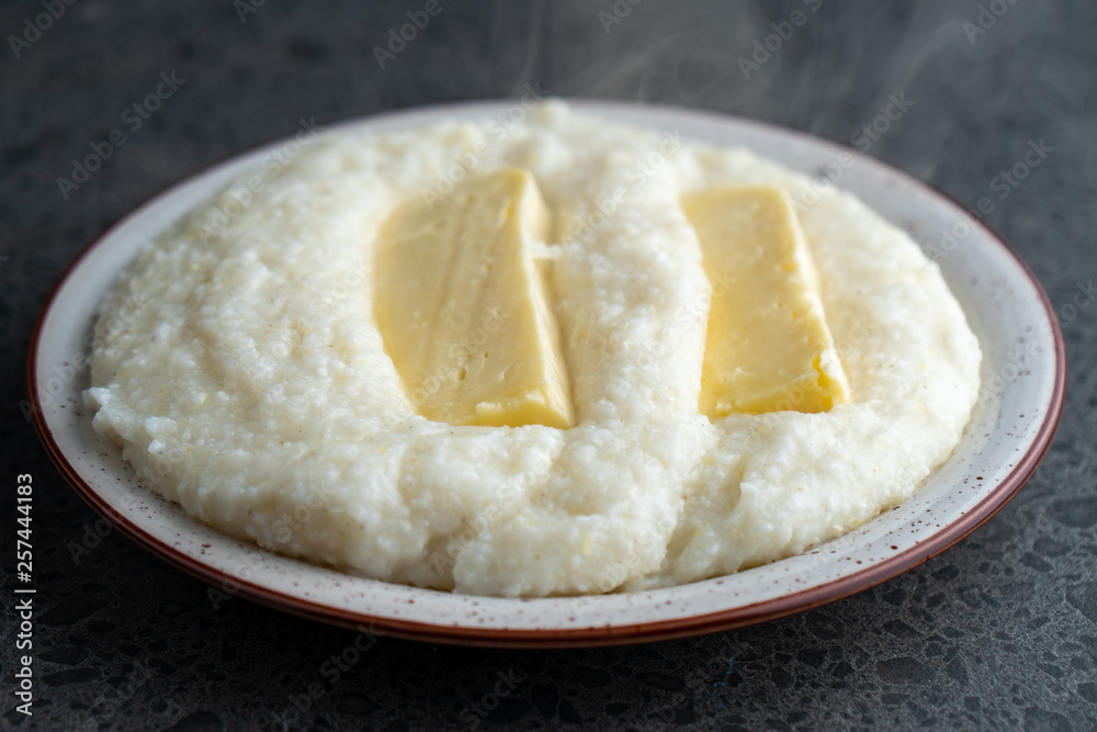Mengrelian corn mamalica (ghomi) with cheese. Georgian food. Mengrelian corn mamalica (ghomi) with cheese. Georgian food.