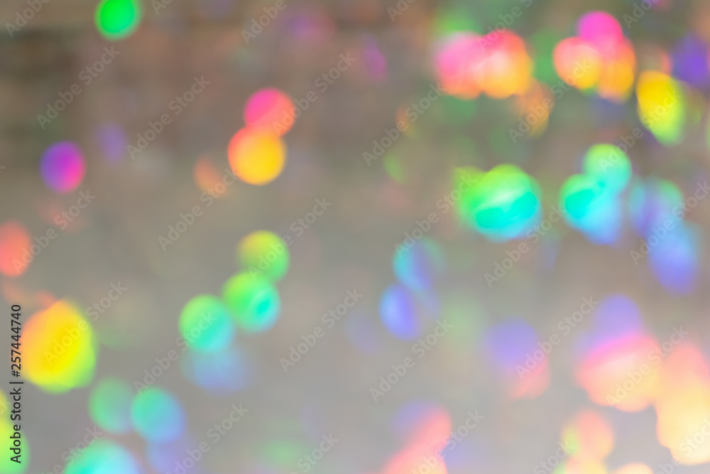 Empty abstract background for layouts. Multicolored spots in blur. The photo is out of focus.