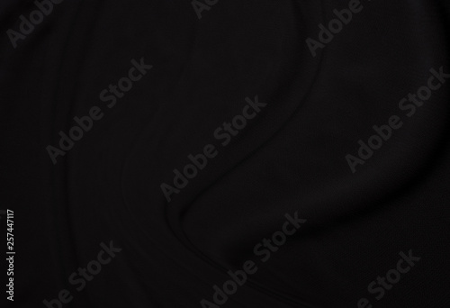 Closeup elegant crumpled of black silk fabric cloth background and texture. Luxury background design.-Image.