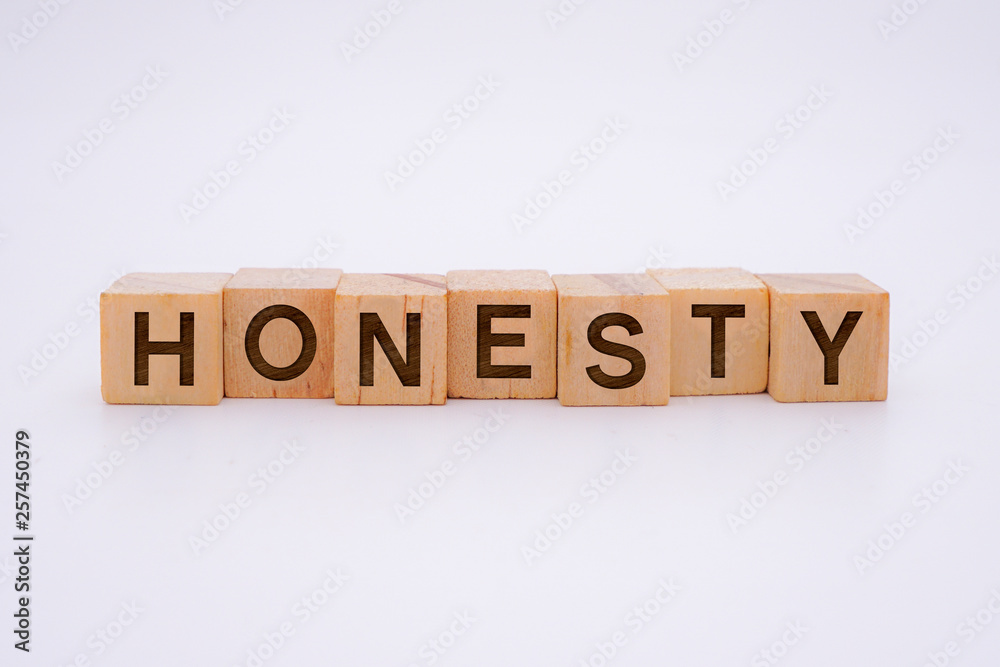 HONESTY Word Written In Wooden Cube HONESTY Word Written In Wooden Cube