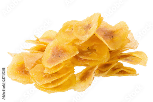 Dried banana chips. Yellow deep fried slices of bananas Isolated on white background
