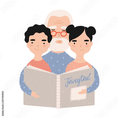 Granddad reading book with grandchildren