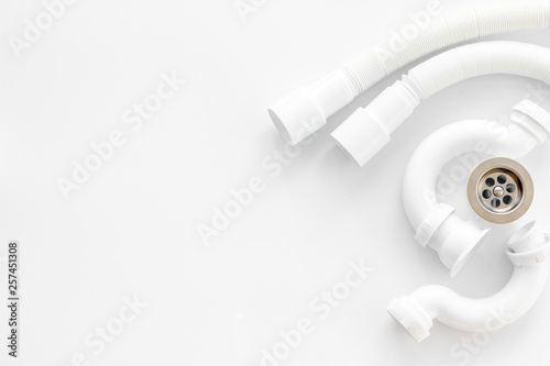 Professional instruments for plumber on white background top view space for text