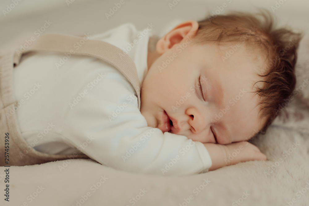 Portrait of a newborn baby sleeping