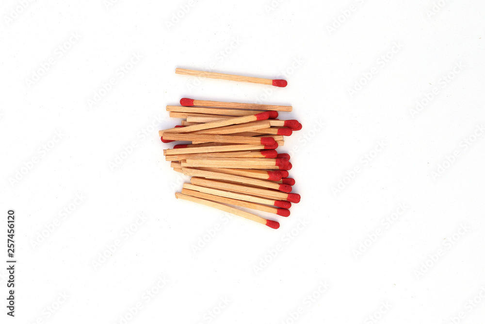 Matchstick out of matchbox isolated on white background Matchstick out of matchbox isolated on white background