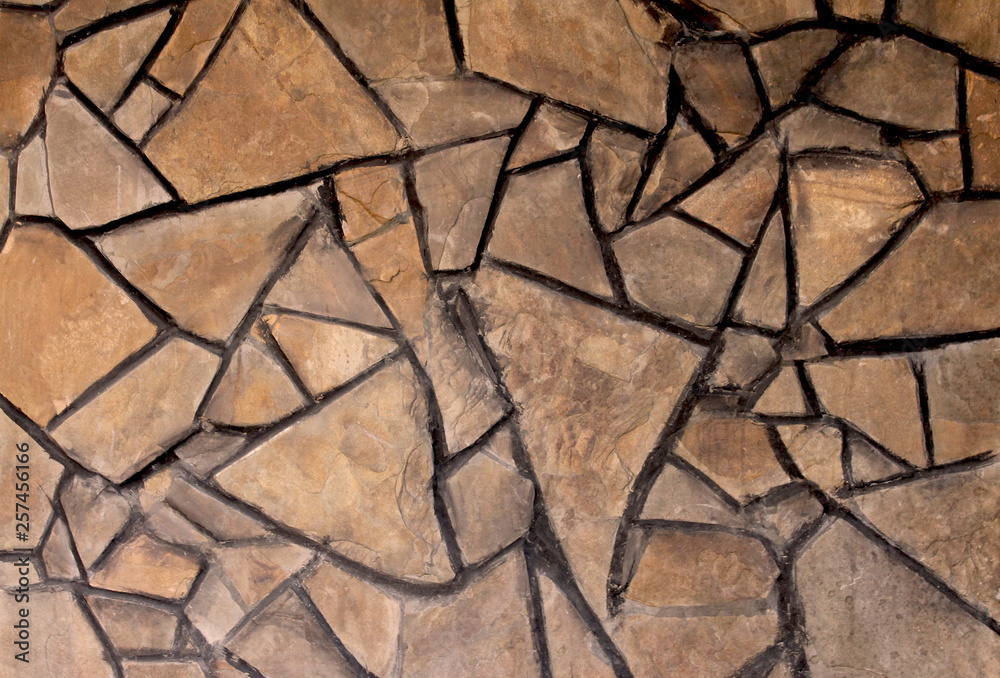 Background texture of a wall of chopped stone Background texture of a wall of chopped stone